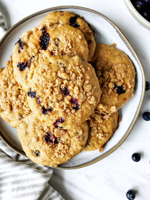 Blueberry muffin tops Blueberry muffin tops on a plate and blueberries in a bowl